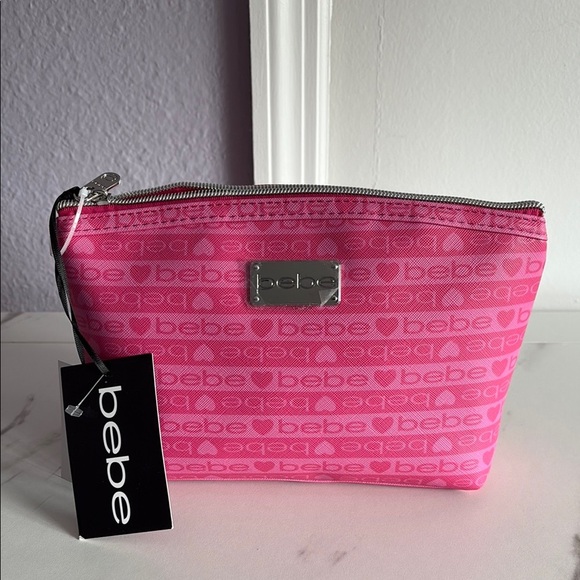 bebe Handbags - Bebe Pink Cosmetic Bag New with tags